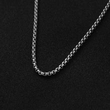 Load image into Gallery viewer, Two-Tone Twisted Chain Cross Necklace – Polished Gold &amp; Silver Finish Pendant – Modern Religious Jewelry for Men and Teens – Minimalist Faith-Inspired Gift
